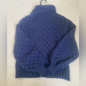 Blue turtleneck sweater
